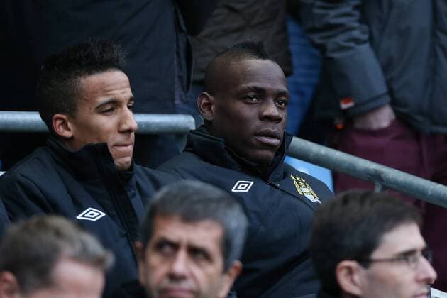 Football - 2012 2013 FA Cup - Third Round: Manchester City vs. Watford FC Manchester City s Mario Balotelli sits on the bench at Etihad Stadium, Manchester 