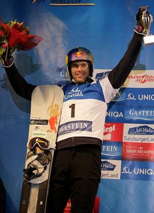 SNOWBOARD - FIS WC Bad Gastein, PSL, Herren BAD GASTEIN,AUSTRIA,11.JAN.13 - SNOWBOARD - FIS Weltcup, Parallel Slalom der Herren, Siegerehrung. Bild zeigt den Jubel von Roland Fischnaller (ITA). Keywords: Pokal. 