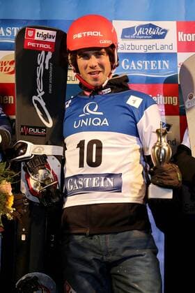 SNOWBOARD - FIS WC Bad Gastein, PSL, Herren BAD GASTEIN,AUSTRIA,11.JAN.13 - SNOWBOARD - FIS Weltcup, Parallel Slalom der Herren, Siegerehrung. Bild zeigt den Jubel von Zan Kosir (SLO). Keywords: Pokal. 