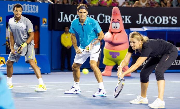 TENNIS - Australian Open 2012 MELBOURNE,AUSTRALIEN,12.JAN.13 - TENNIS - Grand Slam, Australian Open, Kids Tennis Day. Bild zeigt Jo-Wilfried Tsonga (FRA), Roger Federer (SUI) und Victoria Azarenka (BLR). 