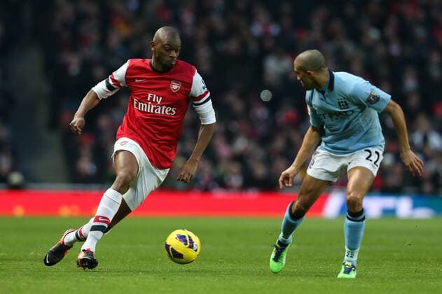 Football - 2012 2013 Premier League - FC Arsenal London vs. Manchester City Arsenal s Abou Diaby and Manchester City s Gael Clichy at the Emirates Stadium, London 