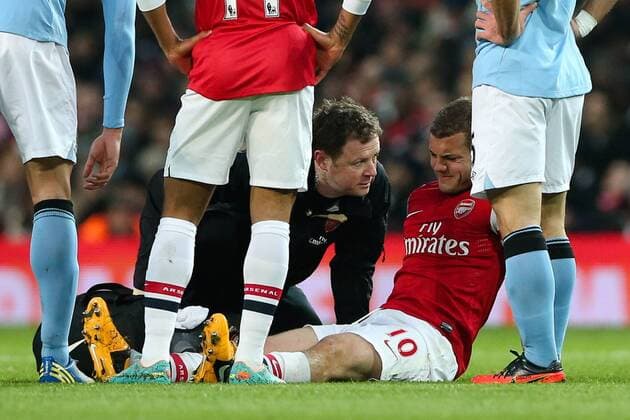 Football - 2012 2013 Premier League - FC Arsenal London vs. Manchester City Arsenal s Jack Wilshere is hurt at the Emirates Stadium, London 
