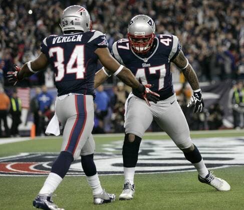 New England Patriots running back Shane Vereen (34) gets a high five from tight end Michael Hoomanawanui after Vereen scored on a one yard touchdown in the first quarter of the AFC Divisional Playoff against the Houston Texans at Gillette Stadium Foxborough, Massachusetts on January 13, 2013. The Patriots defeated the Texans 41-28.  BOS2013011302