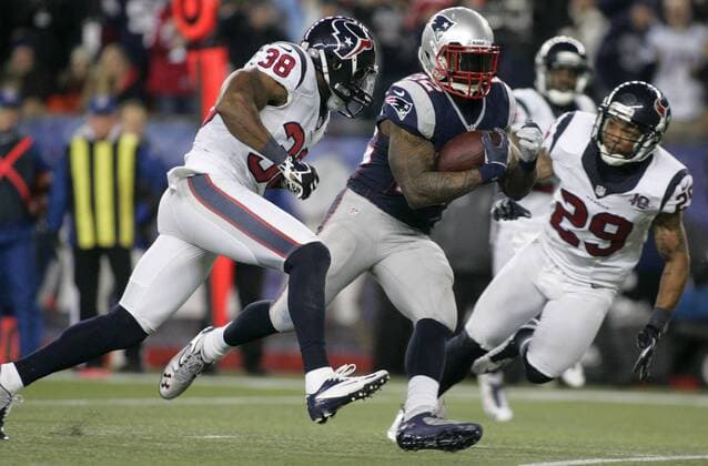 Houston Texans short safety Danieal Manning (38) and free safety Glover Quin (29) close in on New England Patriots running back Stevan Ridley on 23-yard carry in the third quarter of the AFC Divisional Playoff at Gillette Stadium Foxborough, Massachusetts on January 13, 2013. The Patriots defeated the Texans 41-28.  BOS2013011306