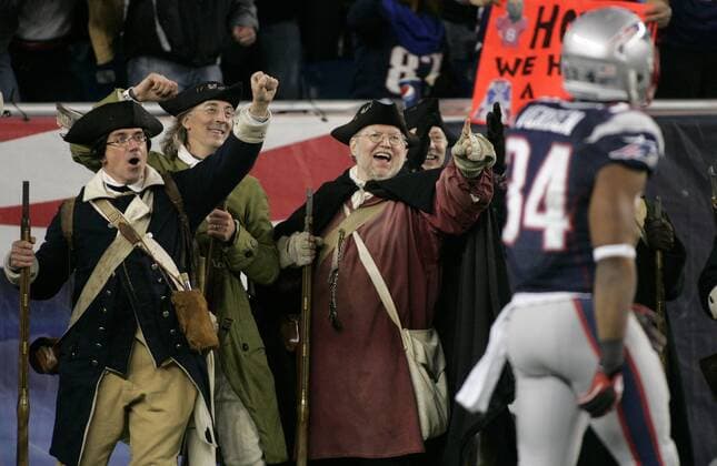 Members of the End Zone Militia cheer on New England Patriots running back Shane Vereen (34) after Vereen s 33-yard touchdown reception in the fourth quarter of the AFC Divisional Playoff against the Houston Texans at Gillette Stadium Foxborough, Massachusetts on January 13, 2013. The Patriots defeated the Texans 41-28.  BOS2013011308