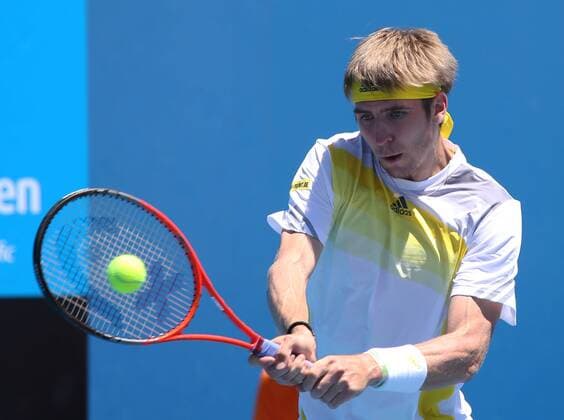 Australian Open 2013, Melbourne Park,ITF Grand Slam Tennis Tournament, Cedrik-Marcel Stebe (GER),Aktion,Einzelbild,Halbkoerper,Querformat,
