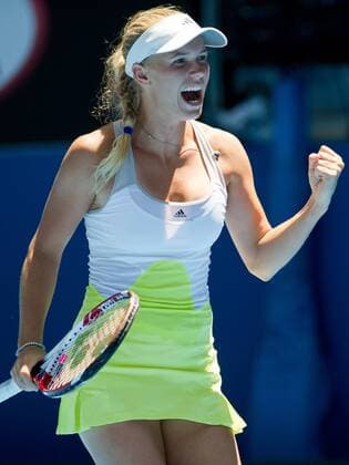 (130115) -- MELBOURNE, Jan. 15, 2013 (Xinhua) -- Caroline Wozniacki of Denmark celebrates after her women s singles first round match on the second day of 2013 Australian Open tennis tournament in Melbourne, Australia, Jan. 15, 2013. 