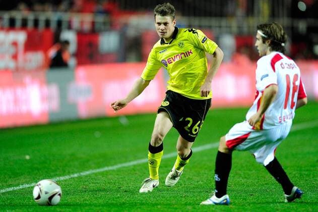15.12.2010, UEFA Europa League, FC Sevilla - Borussia Dortmund (L-R) Lukasz Piszcze (Borussia Dortmund) Diego Capel (Sevilla) Nur fuer redaktionelle Verwendun