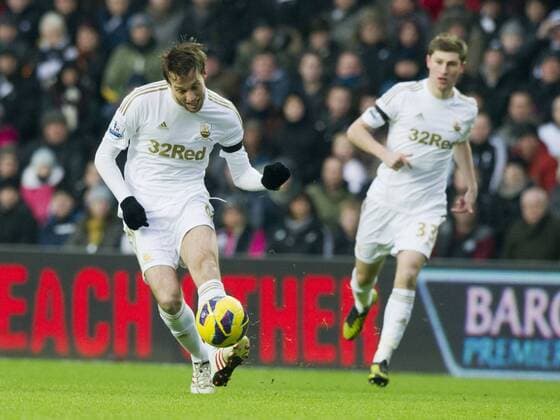 Football - 2012 2013 Premier League - Swansea City vs. Stoke City michu shoots at goal 