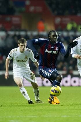 Football - 2012 2013 Premier League - Swansea City vs. Stoke City kenwyne jones breaks for stoke 