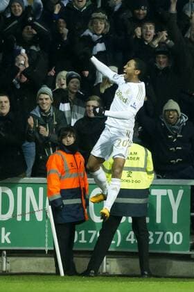 Football - 2012 2013 Premier League - Swansea City vs. Stoke City jonathan de guzman leaps to celebrate his 2nd goal for swansea 