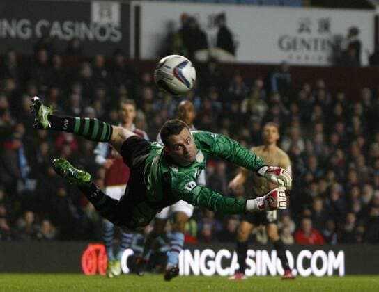Football- 2012 13 Carling Cup-Semi Final-2nd Leg-Aston Villa vs. Bradford City - Aston Villa s Shay Given makes a fine save at Villa Park 