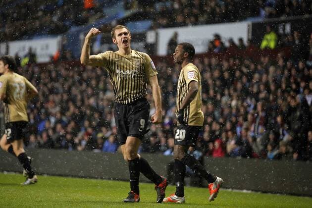 James Hanson celebrates his goal, the first of the game for Bradford Football - Aston Villa v Bradford City - Capital One Cup semi final second leg - Villa Park - Birmingham - Season 12 13 - 22.01.2013..Mandatory credit: Malcolm Couzens Sportimage EDITORIAL USE ONLY. No use with unauthorised audio, video, data, fixture lists, club league logos or live services. Online in-match use limited to 120 images, no video emulation. No use in betting, games or single club league player publications.