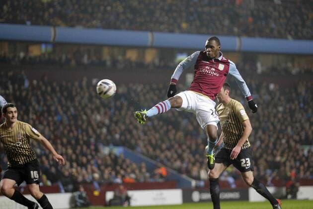 Christian Benteke opens the scoring for Aston Villa - Football - Aston Villa v Bradford City - Capital One Cup semi final second leg - Villa Park Birmingham - Season 12 13 - 22.01.2013..Mandatory credit: Malcolm Couzens Sportimage EDITORIAL USE ONLY. No use with unauthorised audio, video, data, fixture lists, club league logos or live services. Online in-match use limited to 120 images, no video emulation. No use in betting, games or single club league player publications.