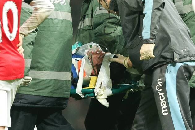 Football - 2012 2013 Premier League - Arsenal vs. West Ham United West Ham s Dan Potts is badly injured and has an oxygen mask and neck brace fitted at the Emirates Stadium, London 