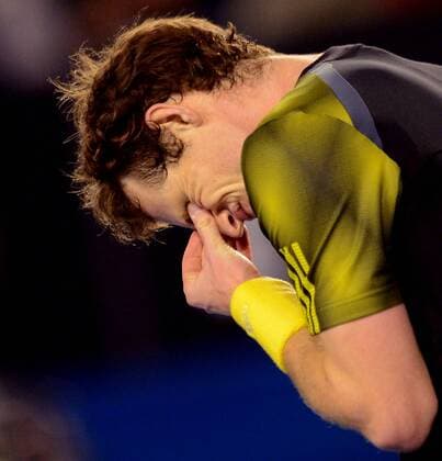(130125) -- MELBOURNE, Jan. 25, 2013 (Xinhua) -- Andy Murray of Britain reacts during the men s singles semifinal match at the 2013 Australian Open tennis tournament in Melbourne, Australia, Jan. 25, 2013 (Xinhua Chen Xiaowei) (jyc) AUSTRALIA-MELBOURNE-TENNIS-MEN S SINGLES-SEMIFINAL 