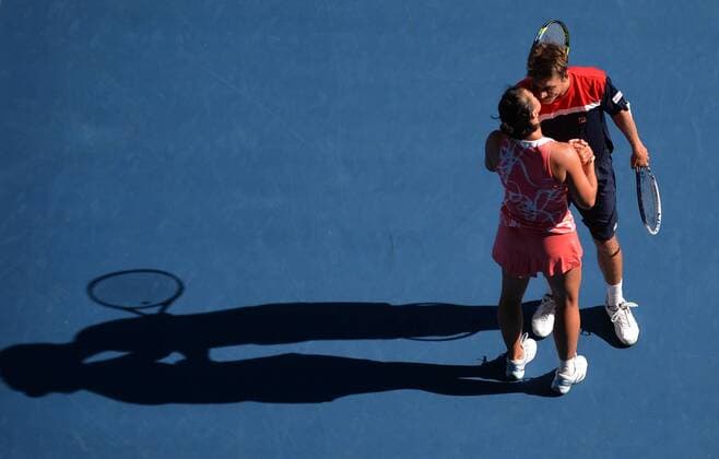 (130127) -- MELBOURNE, Jan. 27, 2013 (Xinhua) -- Jarmila Gajdosova (Bottom) and Matthew Ebden of Australia celebrate their victory after their mixed doubles final match at the 2013 Australian Open tennis tournament in Melbourne, Australia, Jan. 27, 2013. 