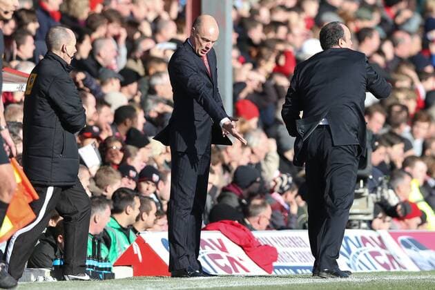 Football - 2012 2013 FA Cup - Fourth Round: FC Brentford vs. Chelsea FC London Manager of FC Brentford Uwe Rosler asks the fourth official why Chelsea Manager Rafa Benitez is on his side at Griffin Park, London 