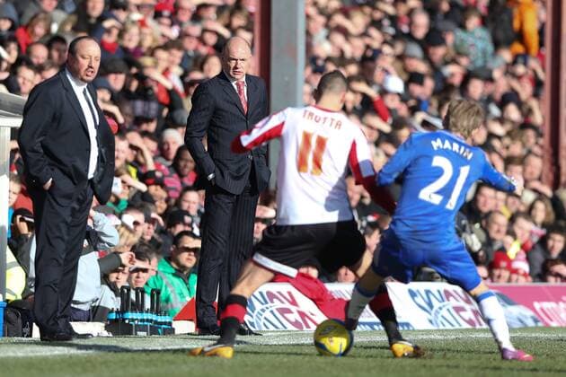 Football - 2012 2013 FA Cup - Fourth Round: FC Brentford vs. Chelsea FC London Chelsea Manager Rafa Benitez and Manager of FC Brentford Uwe Rosler watch play at Griffin Park, London 