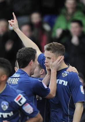 Matt Smith of Oldham Athletic (r) turns to celebrates scoring the first goal - FA Cup 4th Round - Oldham Athletic vs Liverpool - Boundary Park Stadium - Oldham - 27 01 13 - Picture Simon Bellis Sportimage EDITORIAL USE ONLY. No use with unauthorised audio, video, data, fixture lists, club league logos or live services. Online in-match use limited to 120 images, no video emulation. No use in betting, games or single club league player publications.
