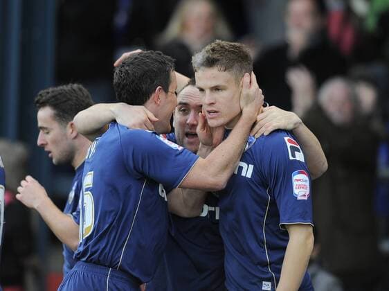 Matt Smith of Oldham Athletic (r) turns to celebrates scoring the first goal - FA Cup 4th Round - Oldham Athletic vs Liverpool - Boundary Park Stadium - Oldham - 27 01 13 - Picture Simon Bellis Sportimage EDITORIAL USE ONLY. No use with unauthorised audio, video, data, fixture lists, club league logos or live services. Online in-match use limited to 120 images, no video emulation. No use in betting, games or single club league player publications.