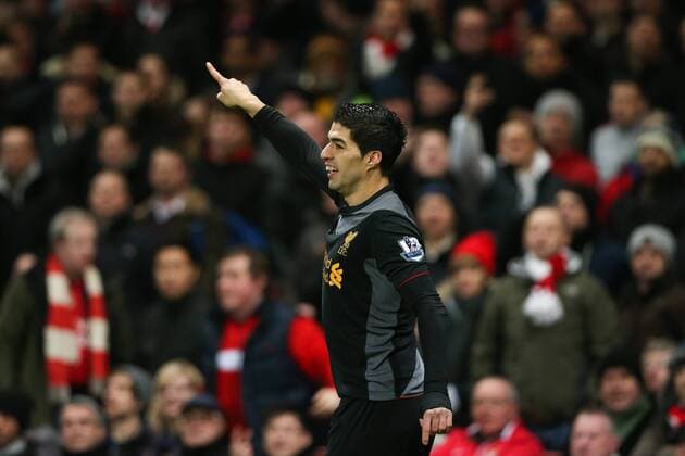 Football - 2012 2013 Premier League - Arsenal FC vs Liverpool FC Liverpool s Luis Suarez celebrates scoring at the Emirates Stadium, London 