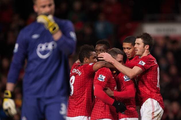 Football - 2012 2013 Premier League - Manchester United vs. Southampton Wayne Rooney of Manchester United celebrates his second goal leaving Southampton s Artur Boruc dejected at Old Trafford 