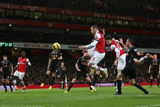 Football - 2012 2013 Premier League - Arsenal FC vs Liverpool FC Olivier Giroud of Arsenal scores at the Emirates Stadium, London 