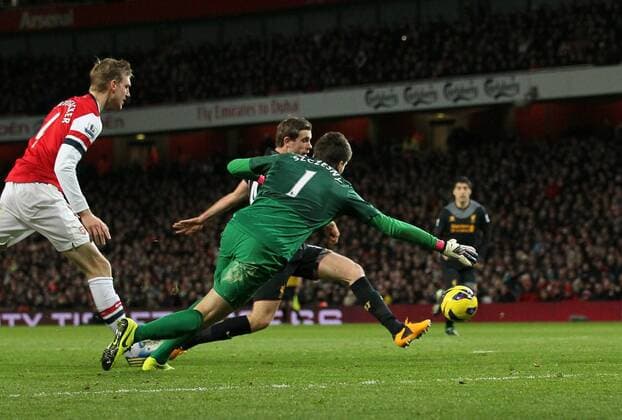 Liverpool s Jordan Henderson scoring his sides second goal.. - FC Arsenal vs FC Liverpool - Barclays Premier League - Emirates Stadium, London- 30 01 13 - EDITORIAL USE ONLY. No use with unauthorised audio, video, data, fixture lists, club league logos or live services. Online in-match use limited to 120 images, no video emulation. No use in betting, games or single club league player publications.