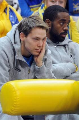 ITAR-TASS: MOSCOW REGION, RUSSIA. JANUARY 26, 2013. Players of BC Khimki Petteri Koponen and K.C. Rivers (L-R) seen during the meeting.  RE112908