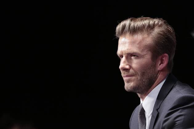 British football player David Beckham attends a press conference at the Parc des Princes stadium in Paris on January 31, 2013 to announce that he joined the team of football club Paris Saint Germain (PSG). 
