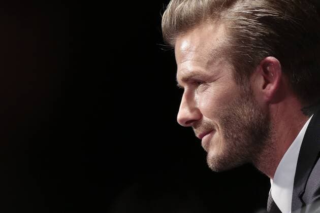 British football player David Beckham attends a press conference at the Parc des Princes stadium in Paris on January 31, 2013 to announce that he joined the team of football club Paris Saint Germain (PSG). 