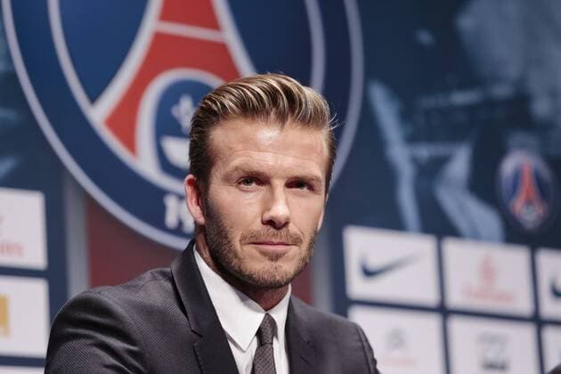 British football player David Beckham attends a press conference at the Parc des Princes stadium in Paris on January 31, 2013 to announce that he joined the team of football club Paris Saint Germain (PSG). 