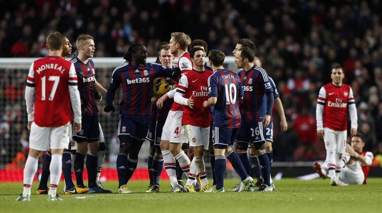 Arsenal s and Stoke s players square up to each other..Arsenal v Stoke - Barclays Premier League - Emirates Stadium, London- 02 02 13 - Picture David Klein Sportimage EDITORIAL USE ONLY. No use with unauthorised audio, video, data, fixture lists, club league logos or live services. Online in-match use limited to 120 images, no video emulation. No use in betting, games or single club league player publications.