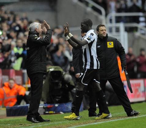 Moussa Sissoko of Newcastle United (R) is congratulated for his performance and two goals by Newcastle United manager Alan Pardew - Barclays Premier League - Newcastle Utd vs Chelsea - St. James Park - Newcastle - 02 02 13 - Picture Richard Lee Sportimage EDITORIAL USE ONLY. No use with unauthorised audio, video, data, fixture lists, club league logos or live services. Online in-match use limited to 120 images, no video emulation. No use in betting, games or single club league player publications.