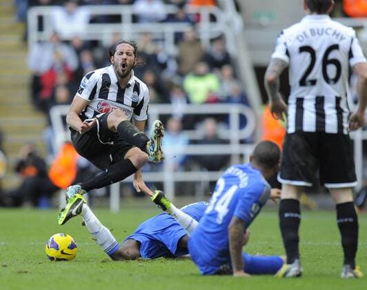 Jonas Gutierrez of Newcastle United is upended by Ramires of Chelsea - Barclays Premier League - Newcastle Utd vs Chelsea - St. James Park - Newcastle - 02 02 13 - Picture Richard Lee Sportimage EDITORIAL USE ONLY. No use with unauthorised audio, video, data, fixture lists, club league logos or live services. Online in-match use limited to 120 images, no video emulation. No use in betting, games or single club league player publications.