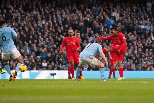 Football - 2012 2013 Premier League - Manchester City vs. Liverpool Daniel Sturridge of Liverpool scores to level it at 1-1 at the Etihad Stadium 