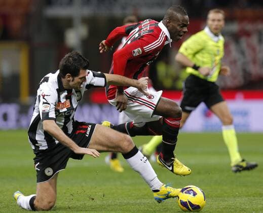 Mario Balotelli Milan, Maurizio Domizzi Udinese, Milano 3 2 2013 .Stadio S.Siro . Football Calcio 2012 2013 Serie A. AC Milan - Udinese Calcio. MarcoxBertorello