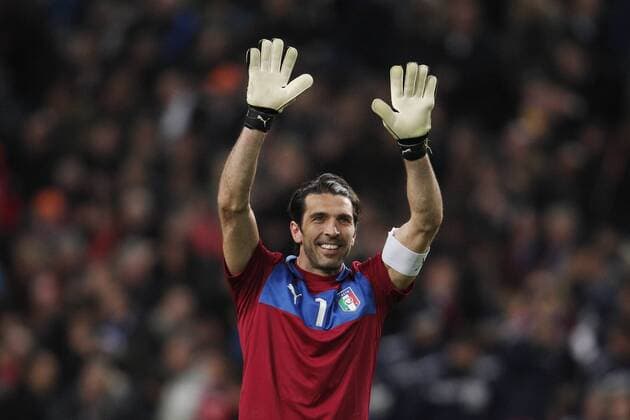 Gianluigi Buffon thanks the Italian supporters after the match 