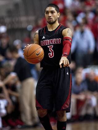 Feb. 6, 2013 - Piscataway, New Jersey, U.S. - February 6 2013: Louisville s guard Peyton Siva (3) calls a play while bringing the ball up court in the first half during Big East Conference basketball action between the Rutgers Scarlet Knights and the Louisvile Cardinals at the Louis Brown Athletic Center (The RAC) in Piscataway, New Jersey. Louisville defeated Rutgers 68-48. NCAA College League USA Basketball 2013: Louisville vs Rutgers FEB 06 - ZUMAcw2