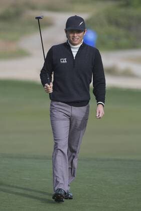 Ryuji Imada walks on the 10th green of the Monterey Peninsula Country Club at the AT&T National Pro Am in Pebble Beach, California on February 7, 2013.  SXP20130200702