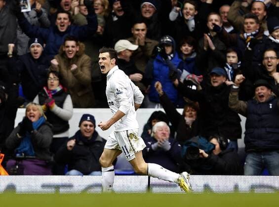 Tottenham s Gareth Bale celebrates scoring his second goal..Tottenham Hotspur v Newcastle United - Barclays Premier League - White Hart Lane, London- 09 02 13 - Picture David Klein Sportimage EDITORIAL USE ONLY. No use with unauthorised audio, video, data, fixture lists, club league logos or live services. Online in-match use limited to 120 images, no video emulation. No use in betting, games or single club league player publications.