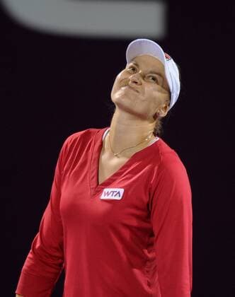 DOHA, Feb. 14, 2013 -- Nadia Petrova of Russia reacts during the women s singels third round match at the WTA Tennis Damen Qatar Open tennis tournament in Doha, Qatar, Feb. 14, 2013. 