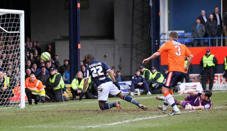 Millwall s Dany N Guessan scoring his sides third goal..Luton Town v Millwall - FA Cup 5th Round - Kenilworth Road, Luton- 16 02 13 - Picture David Klein Sportimage EDITORIAL USE ONLY. No use with unauthorised audio, video, data, fixture lists, club league logos or live services. Online in-match use limited to 120 images, no video emulation. No use in betting, games or single club league player publications.