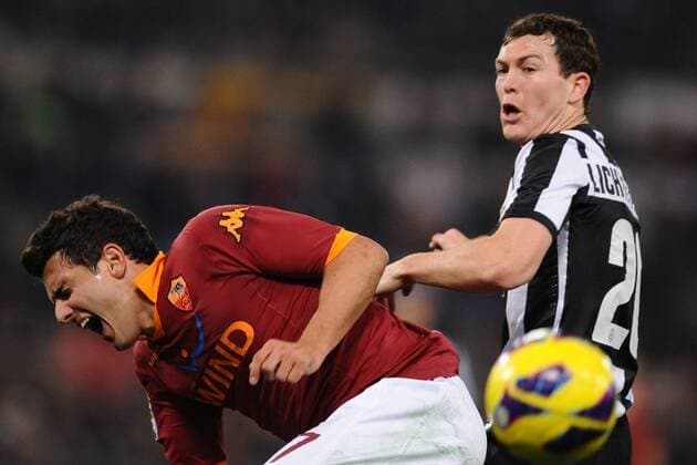 Stephan Lichtsteiner Juventus, Marquinhos Roma.16 02 2013 Roma.Stadio Olimpico.Football Calcio 2012 2013 Campionato di Calcio Serie A. AS Roma - Juventus Turin. AntoniettaxBaldassarre