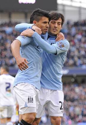 Sergio Kun Aguero of Manchester City celebrates scoring the second goal with David Silva of Manchester City - FA Cup 5th Round - Manchester City vs Leeds Utd - Etihad Stadium - Manchester - 17 02 13 - EDITORIAL USE ONLY. No use with unauthorised audio, video, data, fixture lists, club league logos or live services. Online in-match use limited to 120 images, no video emulation. No use in betting, games or single club league player publications.