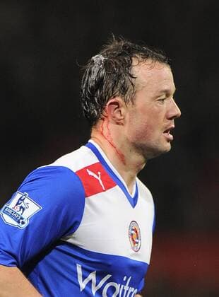 Noel Hunt of Reading with blood streaming from a cut on his head - FA Cup 5th Round - Manchester Utd vs Reading - Old Trafford Stadium - Manchester - 18 02 13 - Picture Simon Bellis Sportimage EDITORIAL USE ONLY. No use with unauthorised audio, video, data, fixture lists, club league logos or live services. Online in-match use limited to 120 images, no video emulation. No use in betting, games or single club league player publications.