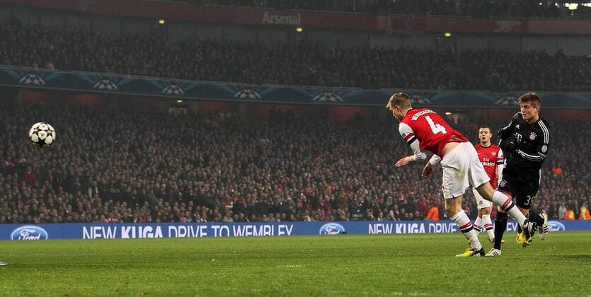Munich s Toni Kroos scoring his sides opening goal..Arsenal v Bayern Munich - Champions League Second Round, First Leg- Emirates Stadium, London- 19 02 13 - Picture David Klein Sportimage EDITORIAL USE ONLY. No use with unauthorised audio, video, data, fixture lists, club league logos or live services. Online in-match use limited to 120 images, no video emulation. No use in betting, games or single club league player publications.