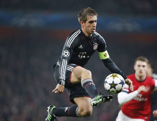 Fussball, Herren, UEFA Champions League, FC Arsenal vs. FC Bayern München, 19.02.2013, Arsenal Stadium London, philipp Lahm, FC Bayern München, Aktion Einzelbild,