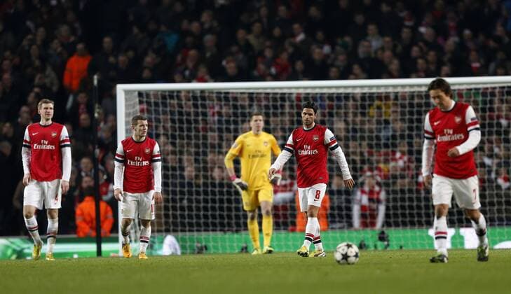 Arsenal s Mikel Arteta looks on dejceted after the third Munich goal..Arsenal v Bayern Munich - Champions League Second Round, First Leg- Emirates Stadium, London- 19 02 13 - Picture David Klein Sportimage EDITORIAL USE ONLY. No use with unauthorised audio, video, data, fixture lists, club league logos or live services. Online in-match use limited to 120 images, no video emulation. No use in betting, games or single club league player publications.